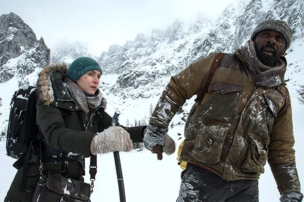 Two strangers. One incredible journey. Idris Elba and Kate Winslet star in The Mountain Between Us, in theaters October 6. Image courtesy of 20th Century Fox
