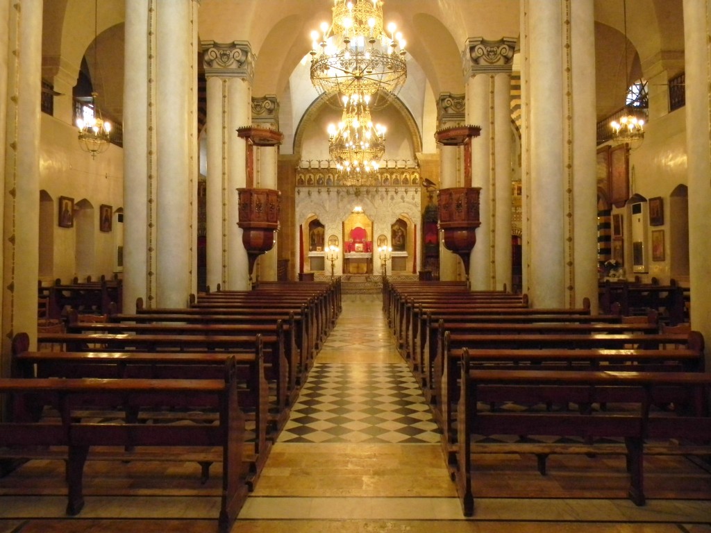 Holy Virgin Melkite Greek Cathedral of Aleppo - by Preacher lad (Holy Virgin Melkite Greek Cathedral of Aleppo, interior view.JPG) [GFDL (https://commons.wikimedia.org/wiki/Commons:GNU_Free_Documentation_License,_version_1.2 and https://creativecommons.org/licenses/by-sa/3.0/deed.en), via Wikimedia Commons