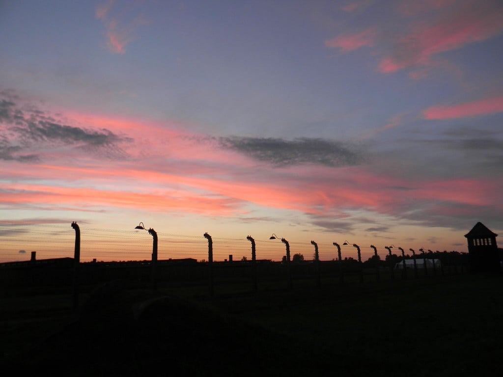 Divine mercy colored sunset over Birkenau (credit: Eugenia Geisel)