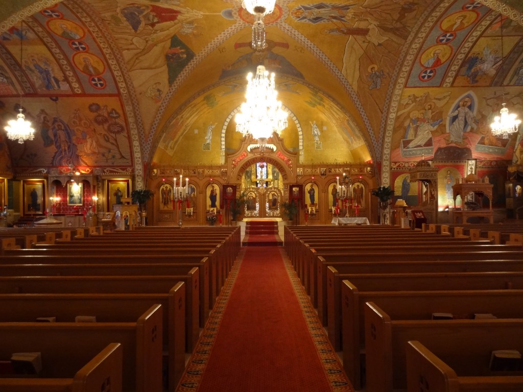  The sanctuary of Transfiguration Greek Orthodox Church, looking towards the altar. Located at 25 Friar John Sarantos Way, Lowell, Massachusetts - by EMW, 19 May 2012 ( Sanctuary_of_Transfiguration_Greek_Orthodox_Church_Lowell_MA_2012-05-19.jpg) (CC BY-SA 3.0 [https://creativecommons.org/licenses/by-sa/3.0/deed.en]), via Wikimedia Commons