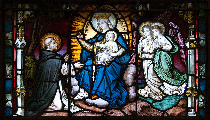  Carlow, County Carlow, Ireland Bottom feature of the left stained glass window in the north transept of Carlow Cathedral, showing how the rosary was given to St Dominic in an apparition by the Blessed Virgin Mary in the year 1214. Created by Franz Mayer & Co. in the 19th century - by Andreas F. Borchert, 3 September 2009 (800px-Carlow_Cathedral_St_Dominic_Receives_the_Rosary_from_the_Virgin_Mary_2009_09_03.jpg) (CC BY-SA 3.0 [https://creativecommons.org/licenses/by-sa/3.0/de/deed.en]), via Wikimedia Commons