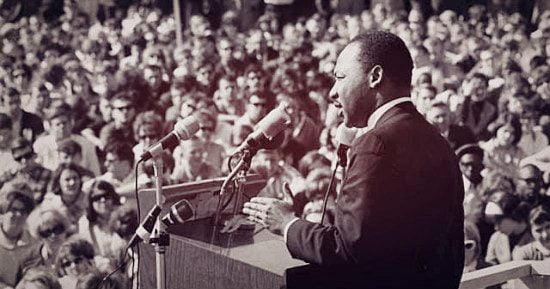 Martin Luther King Jr. at the St Paul Campus of UMN addressing a crowd.