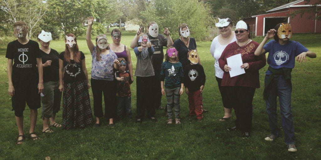 Druids celebrating Mabon wearing animal masks