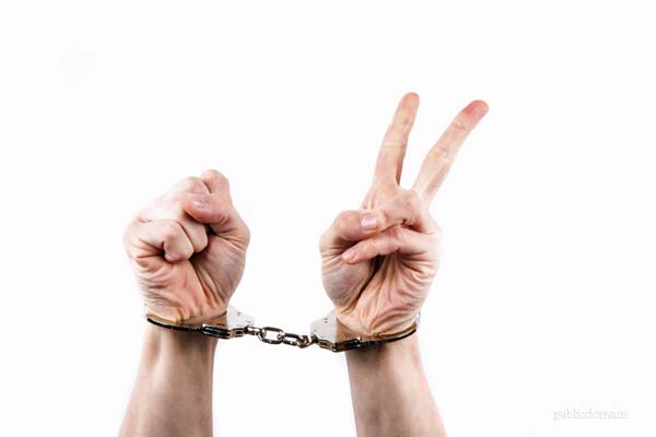 hands-in-handcuffs-1462608774gXI