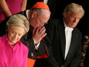 Cardinal Timothy Dolan sitting between Clinton and Trump at the Alfred E. Smith Foundation Memorial Dinner