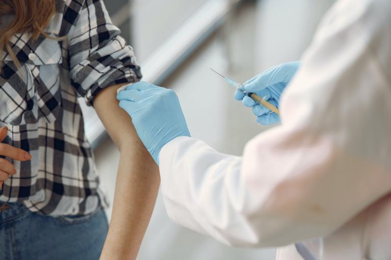 Person being vaccinated.