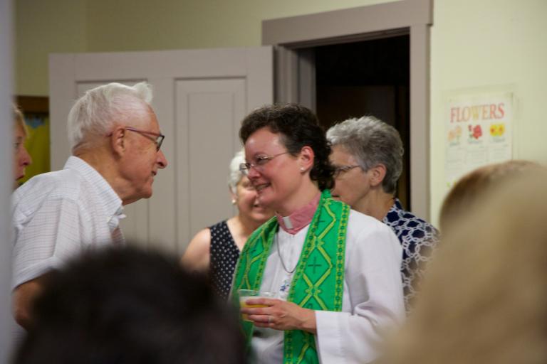 The Rev. Dr. Leah Schade with parishioners. Photo by Dan Hyde. Used with permission.