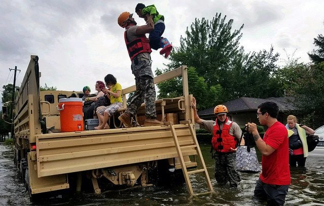 U.S. Soldiers with the Texas Army National Guard rescue Houston residents as floodwaters from Hurricane Harvey continue to rise, Aug. 28, 2017. U.S. Department of Defense. Public domain. flickr.com