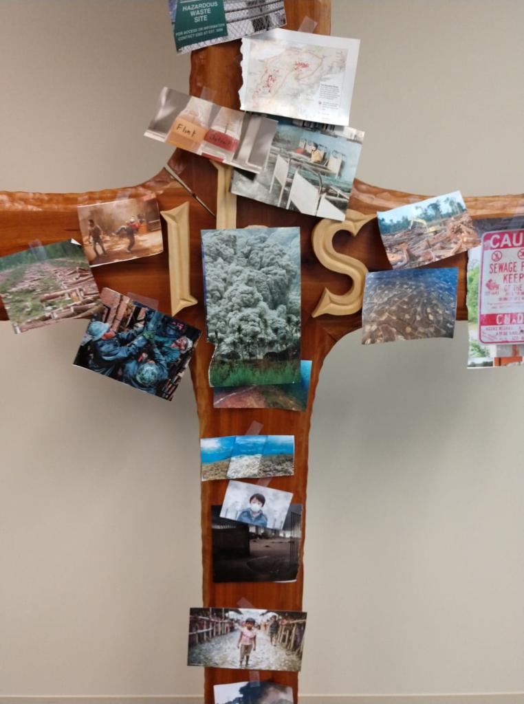 cross, images of environmental devastation