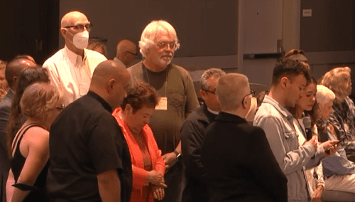 Members of La Iglesia Santa Maria Peregrina responding to apology at 2023 Sierra Pacific Synod (ELCA) Synod Assembly