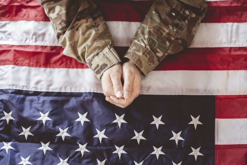 American soldier, hands, American flag