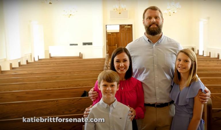Katie Britt and family in empty church