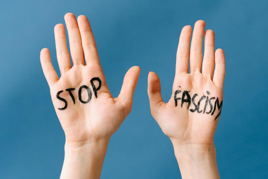 Stop Fascism, written on palms