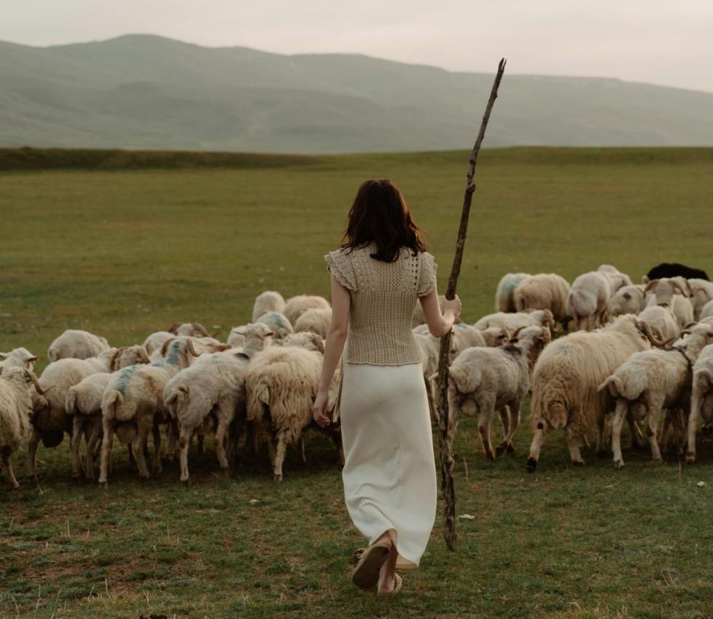 Female shepherd guarding sheep