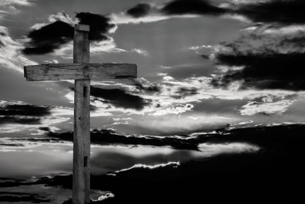Good Friday cross, bleak black and white sky