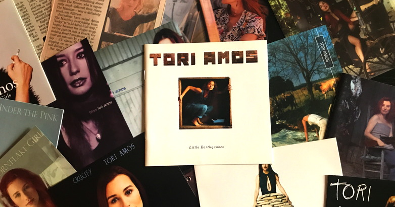 Tori Amos CD covers, newspaper clippings, and tour program book from the author's collection.