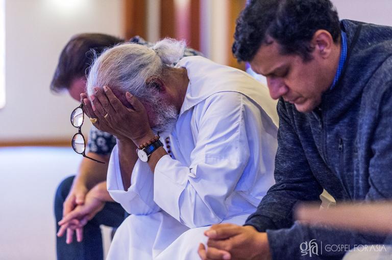 Brother K.P. Yohannan is praying after he shared powerful and challenging message with the staff during a staff meeting in the Chapel on September 27, 2017.