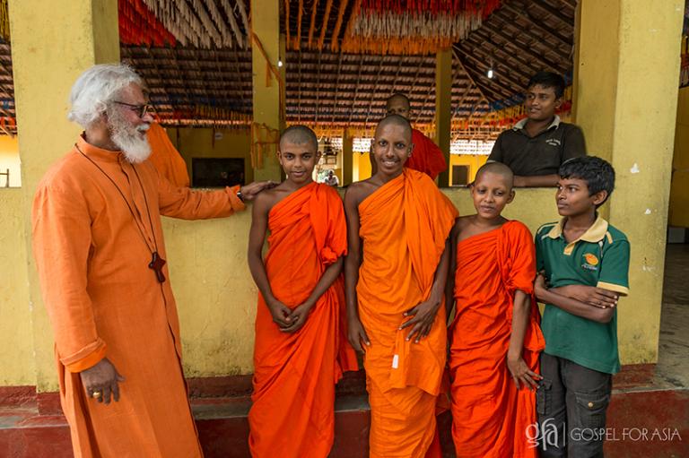 young Buddhist boys after a flood relief - KP Yohannan - Gospel for Asia