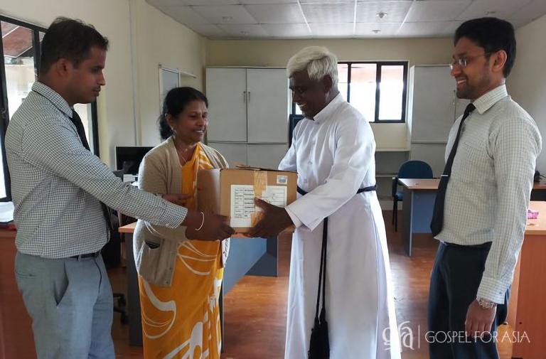Discussing the work of national missionaries in their communities, partnering with local hospitals to help provide for the need for medicines and supplements of those in need, children in particular.