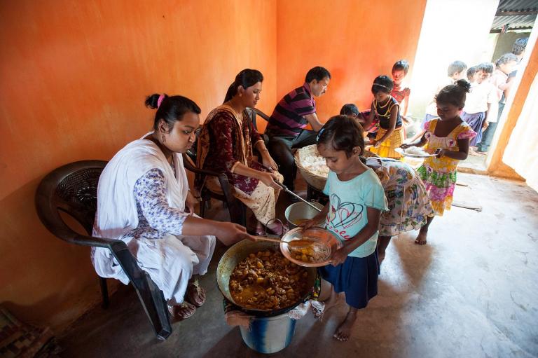 Gospel for Asia-supported workers feeding children