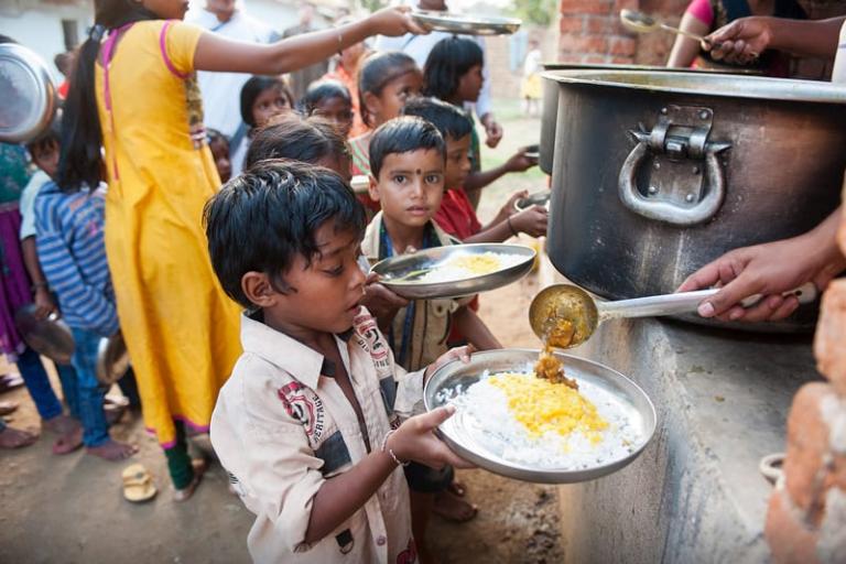 Free meals given out to children at the GFA Bridge of Hope center