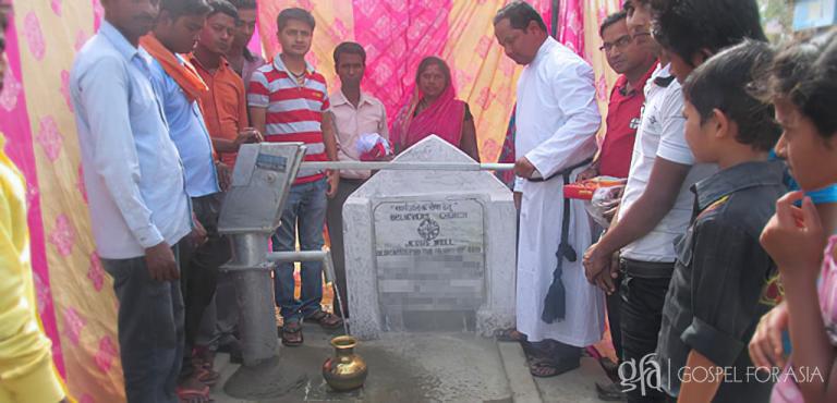 Gospel for Asia founded by Dr. K.P. Yohannan: After the Jesus Well in Pastor Sahay's village was completed (pictured), it was dedicated to the Lord. This well pours out clean water freely to those who come to it for a drink.