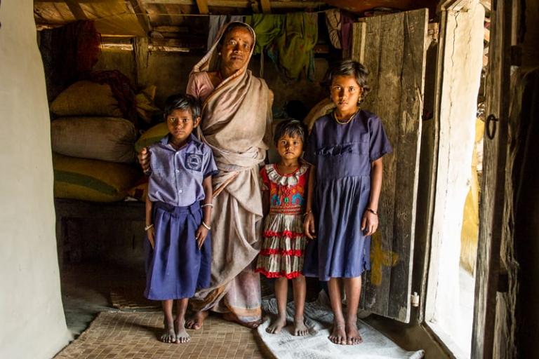 Mother with children inside house