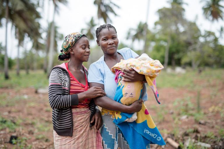 Admira, a victim of child marriage, with her step mother