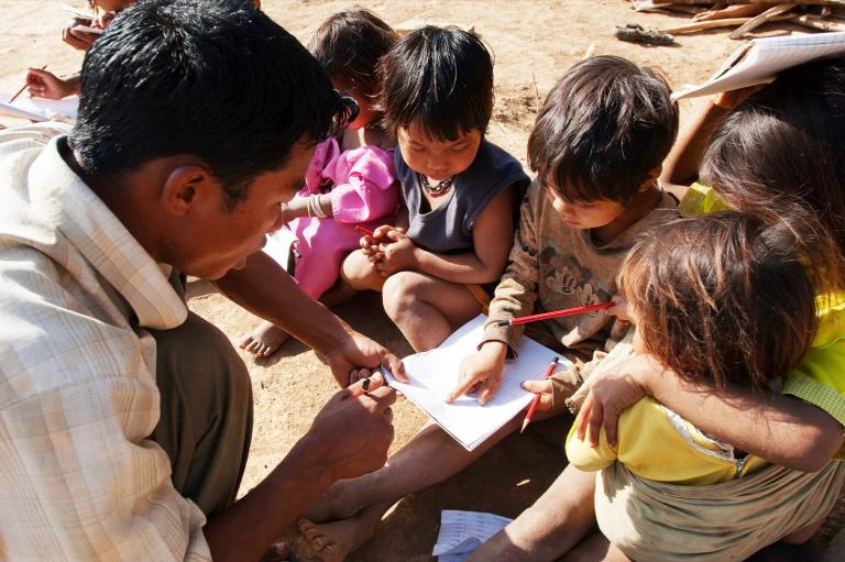 GFA Pastor teaching children by the street