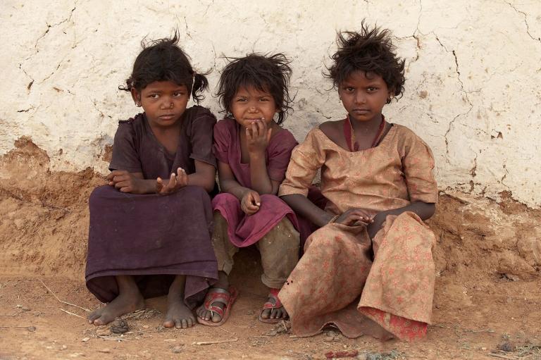 A group of three poor girls