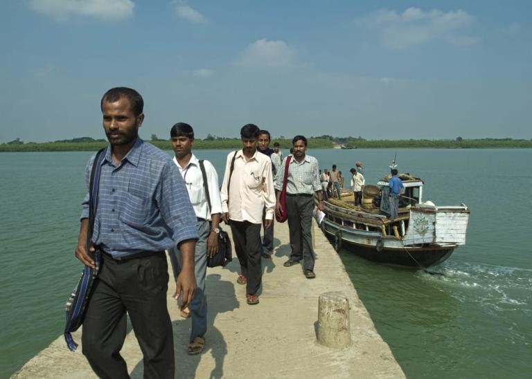 Ritesh and national workers travel between islands through boats to show the love of Jesus