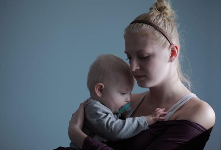 Pensive mother and child