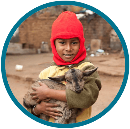 Boy and an income generating gift of a goat