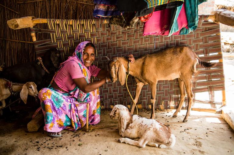 This woman received the gift of a goat that would help lift up her family from generational poverty