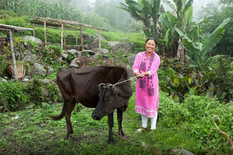 This woman received a gift of a cow that would help provide income for her family amid generational poverty
