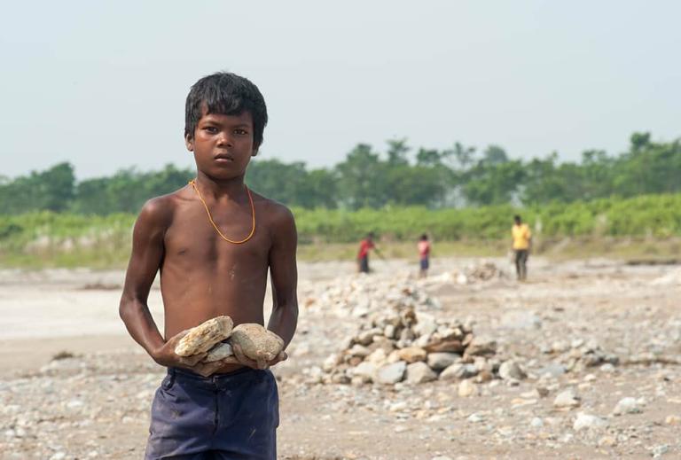 Millions of children in Asia, like this young boy, are involved in child labor