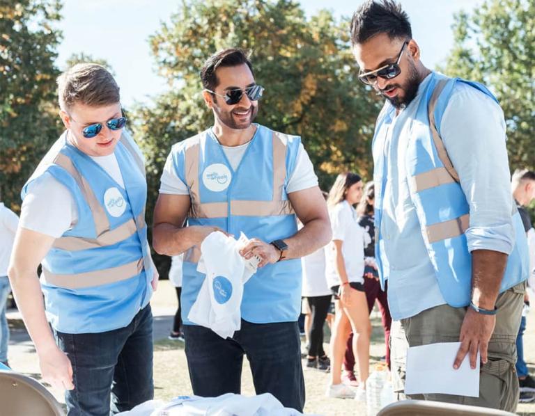 Shaz Memon (centre), founder of Wells on Wheels.