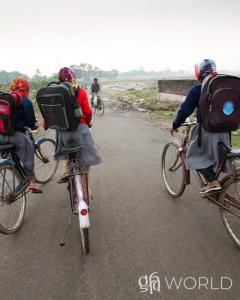 Discussing how a gift of a bicycle from GFA World gift distribution helped a girl gain a school education for a better future.