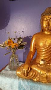 My Buddha and flowers 050917