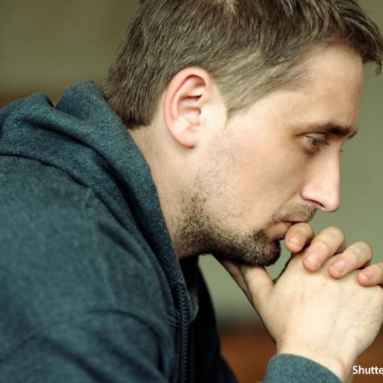 Faith-man-praying-church