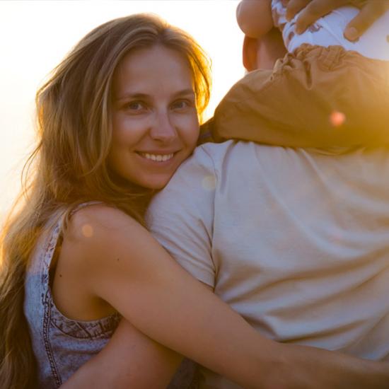 Family-Beach-Sunset_credit-Shutterstock.com