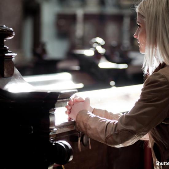 people-woman-praying-church