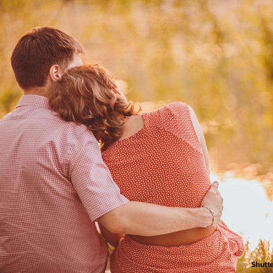 people-couple-hugging-lake