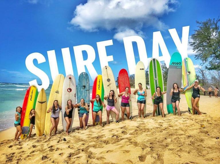Women and surfboards at White Plains beach
