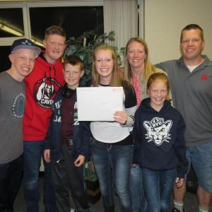 family celebrating a daughter opening her mission call