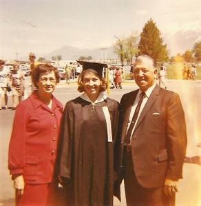 College graduate with fathers and mother