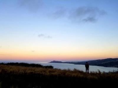 Sunrise over the land and sea