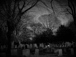 headstones in dark cemetery spiritual gifts family history work