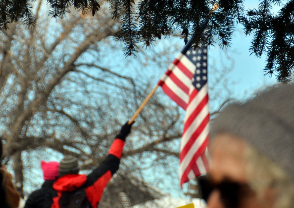 American Flag Held High.