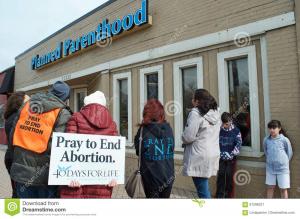 planned-parenthood-ferndale-michigan-march-pro-life-volunteers-praying-usa-to-end-abortion-91296221